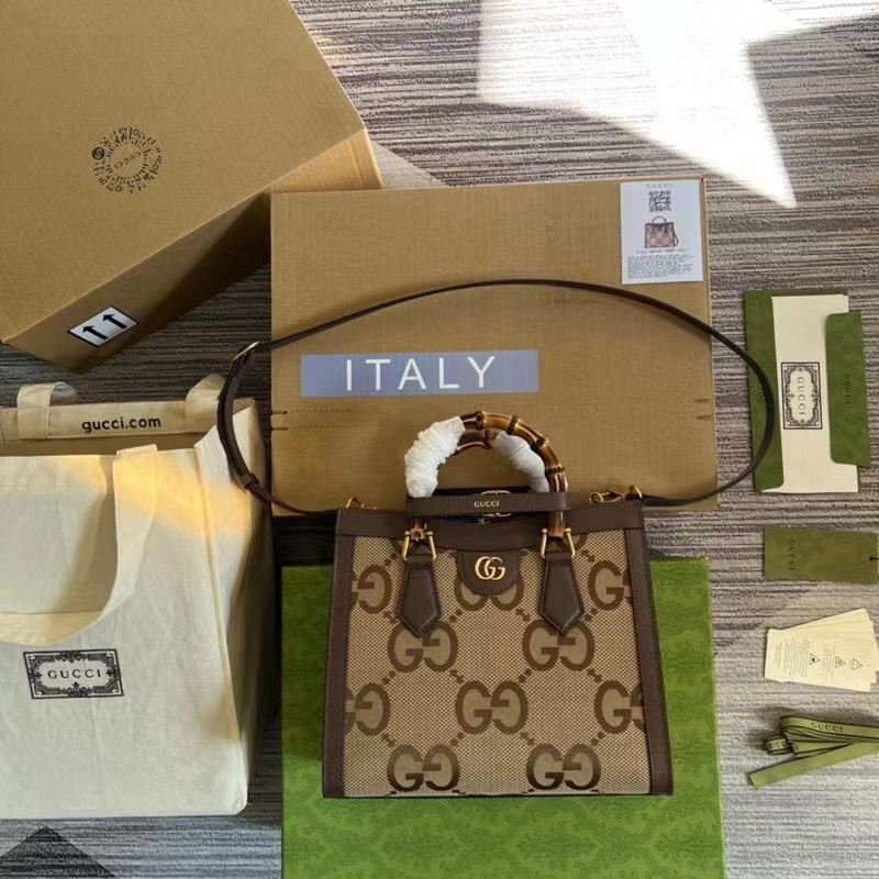 G*u*i top handle bags